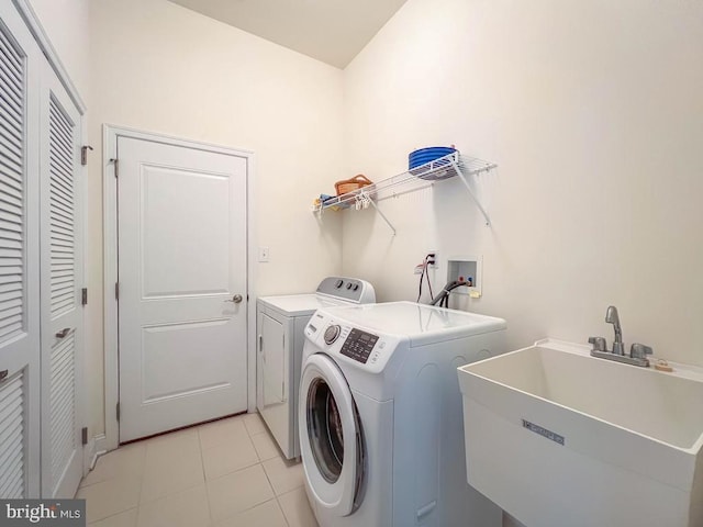 245 Carson Way, Yardley, PA 19067 - laundry area featuring washing machine and clothes dryer and light tile patterned floors