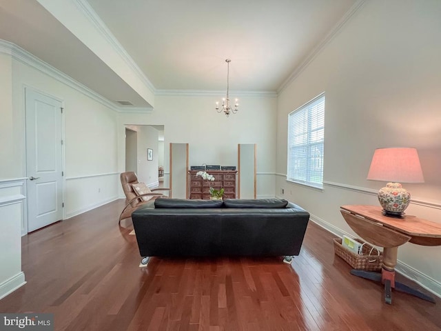 245 Carson Way, Yardley, PA 19067 - living room with wood finished floors, a chandelier, crown molding, and baseboards