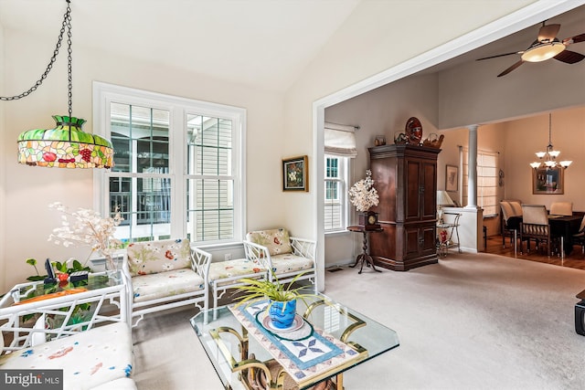 13298 Fieldstone Way, Gainesville, VA 20155 - living area with carpet flooring, a chandelier, ceiling fan, high vaulted ceiling, and decorative columns
