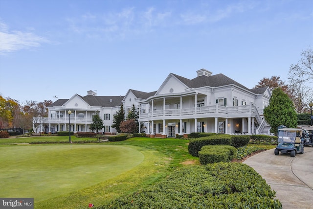 13298 Fieldstone Way, Gainesville, VA 20155 - greek revival house with a putting green, a balcony, and a front lawn