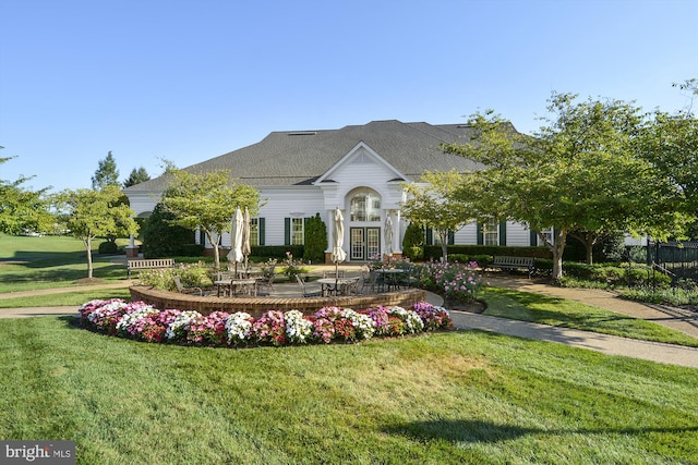 13298 Fieldstone Way, Gainesville, VA 20155 - view of front facade with french doors, a front lawn, and a patio