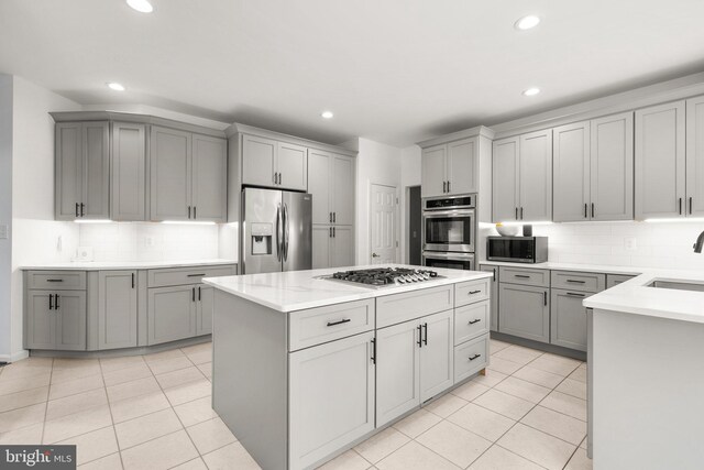818 Northridge Way, Severna Park, MD 21146 - kitchen featuring stainless steel appliances, gray cabinets, decorative backsplash, recessed lighting, and light tile patterned floors