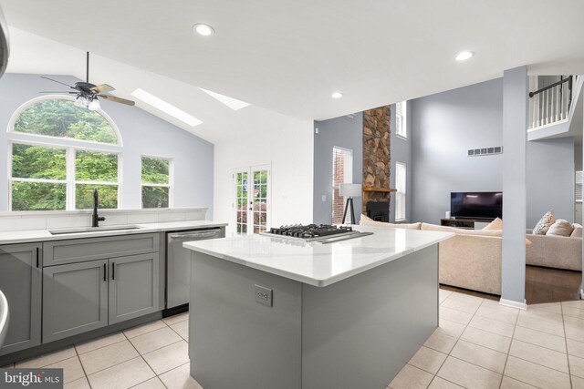 818 Northridge Way, Severna Park, MD 21146 - kitchen featuring stainless steel appliances, gray cabinets, light tile patterned flooring, a ceiling fan, and open floor plan