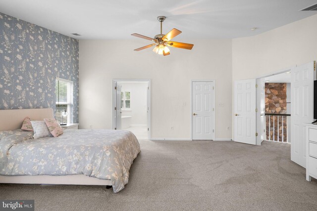 818 Northridge Way, Severna Park, MD 21146 - bedroom featuring carpet, wallpapered walls, high vaulted ceiling, ensuite bath, and a ceiling fan