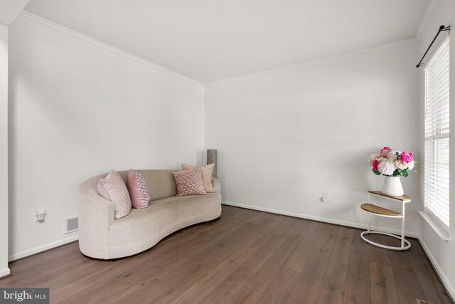 818 Northridge Way, Severna Park, MD 21146 - living area with wood finished floors, ornamental molding, and healthy amount of natural light