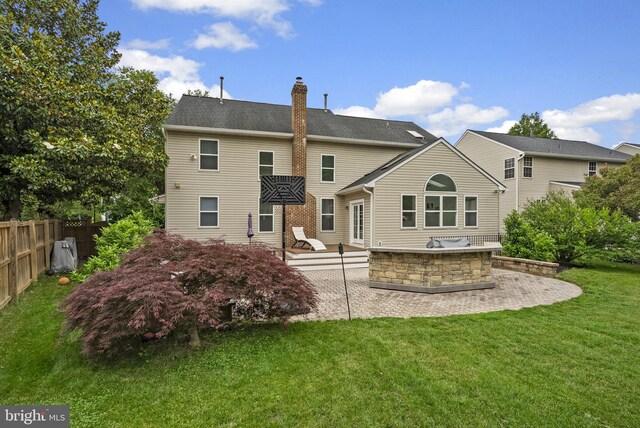 818 Northridge Way, Severna Park, MD 21146 - rear view of house with area for grilling, a patio, and a chimney
