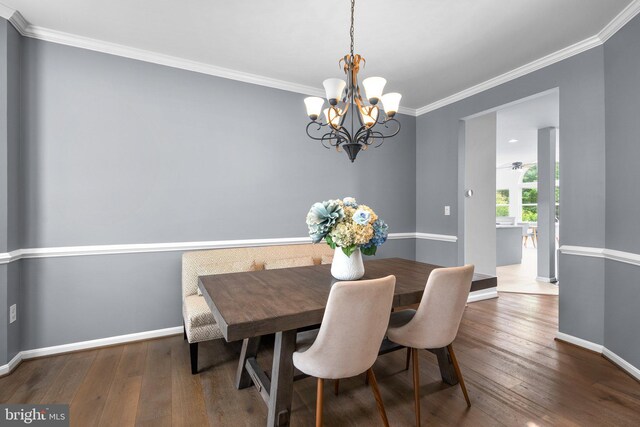 818 Northridge Way, Severna Park, MD 21146 - dining room with wood finished floors, ornamental molding, a chandelier, and a ceiling fan