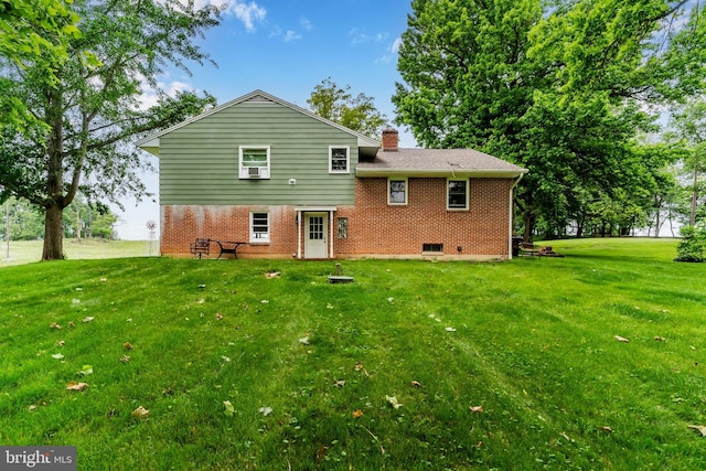 101 Horners Rd, Carlisle, PA 17015 - rear view of property with brick siding, a lawn, and a chimney