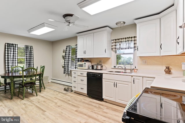 101 Horners Rd, Carlisle, PA 17015 - kitchen featuring black appliances, a sink, a baseboard radiator, ceiling fan, and white cabinets