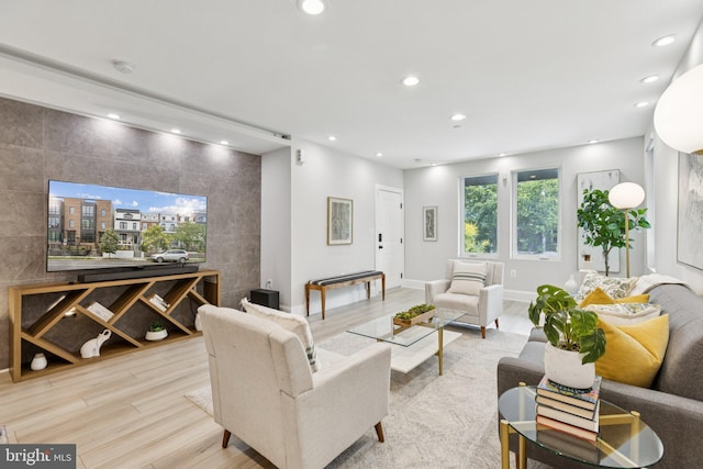 2108 4th St NE Unit A, Washington, DC 20002 - living area with recessed lighting, wood finished floors, baseboards, and tile walls
