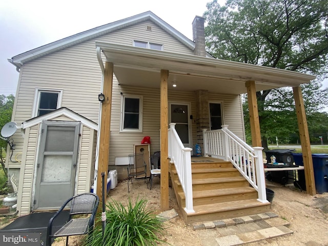 6752 Harding Hwy, Mays Landing, NJ 08330 - back of house featuring a chimney