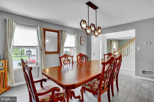 509 W Reeser St, Leesport, PA 19533 - dining room with a chandelier and stairway