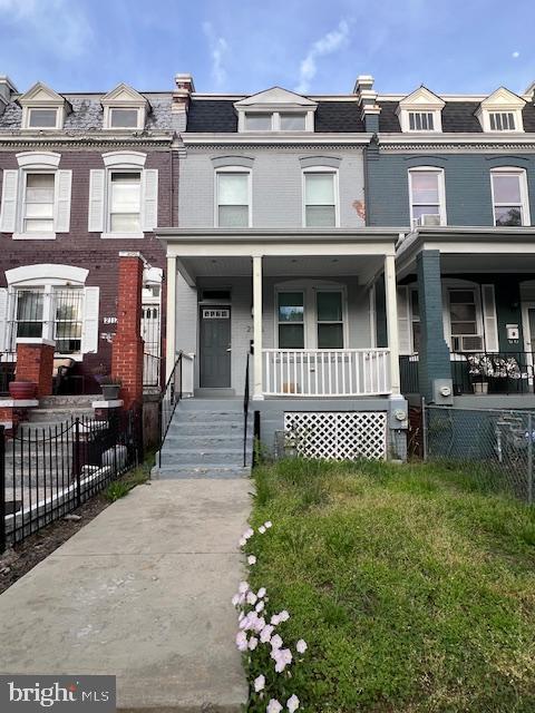 2115 4th St NE, Washington, DC 20002 - view of property with mansard roof and covered porch