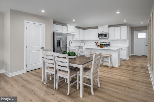 642A Shannon Dr S, Greencastle, PA 17225 - dining area featuring light wood-type flooring, baseboards, and recessed lighting
