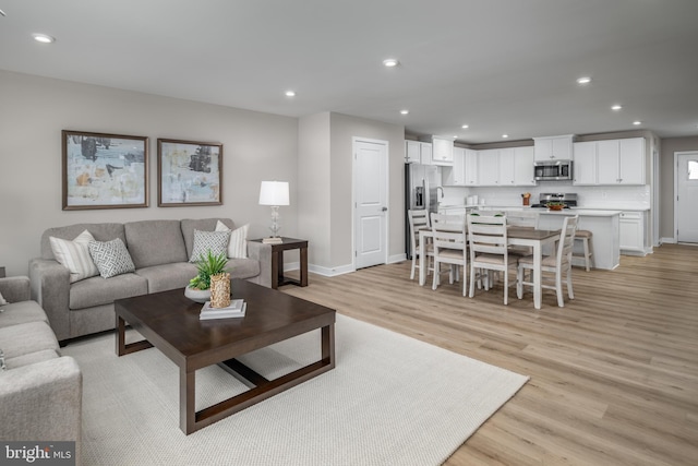 642A Shannon Dr S, Greencastle, PA 17225 - living area featuring light wood finished floors, baseboards, and recessed lighting