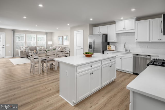 642A Shannon Dr S, Greencastle, PA 17225 - kitchen with stainless steel appliances, a sink, open floor plan, light countertops, and recessed lighting