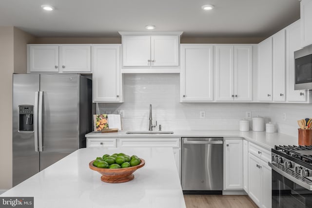 642A Shannon Dr S, Greencastle, PA 17225 - kitchen featuring stainless steel appliances, a sink, light countertops, white cabinetry, and recessed lighting