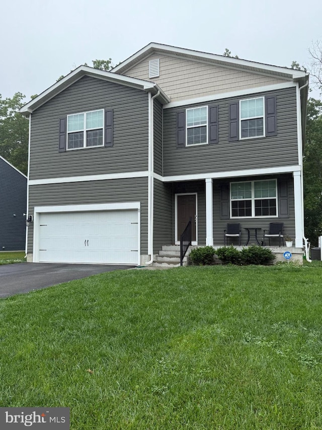 11 Autumn Ln, Egg Harbor Twp, NJ 08234 - view of front of property featuring an attached garage, asphalt driveway, and a front yard