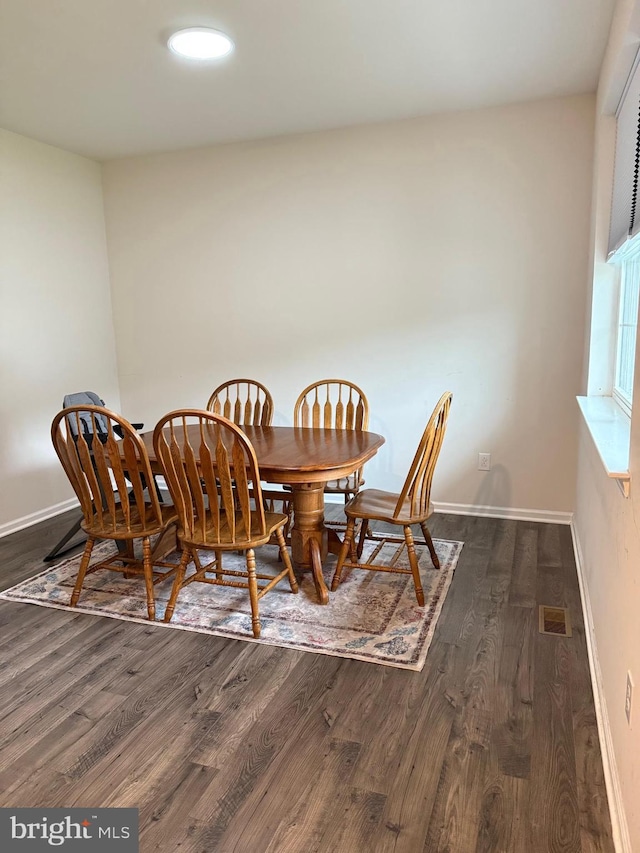 11 Autumn Ln, Egg Harbor Twp, NJ 08234 - dining area featuring dark wood-type flooring and baseboards