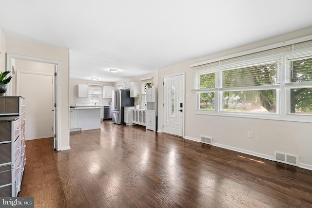 245 Spout Spring Ave, Lumberton, NJ 08048 - unfurnished living room with dark wood-type flooring