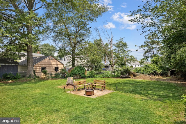 245 Spout Spring Ave, Lumberton, NJ 08048 - view of green lawn with an outdoor fire pit
