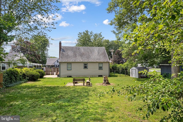 245 Spout Spring Ave, Lumberton, NJ 08048 - rear view of property featuring a storage shed, a chimney, and crawl space