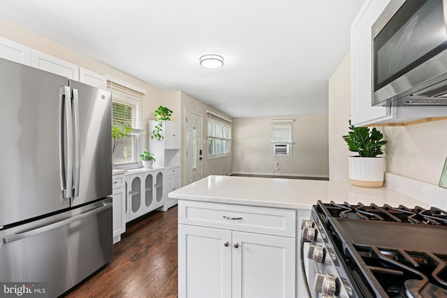 245 Spout Spring Ave, Lumberton, NJ 08048 - kitchen with stainless steel appliances, a peninsula, white cabinetry, and light countertops