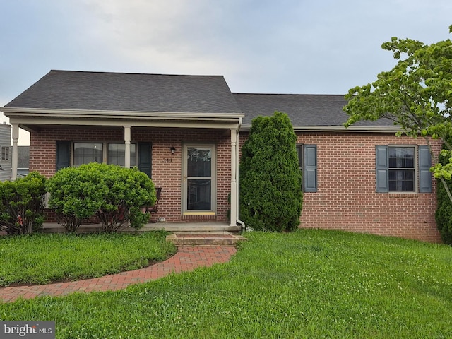 344 Dayspring Ln, Hagerstown, MD 21742 - view of front of property featuring brick siding, a front lawn, and a shingled roof
