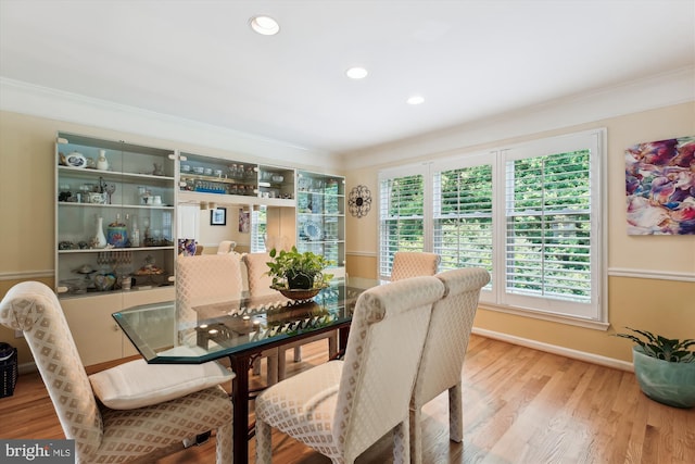 9417 Reach Rd, Potomac, MD 20854 - dining area featuring crown molding, wood finished floors, baseboards, and recessed lighting
