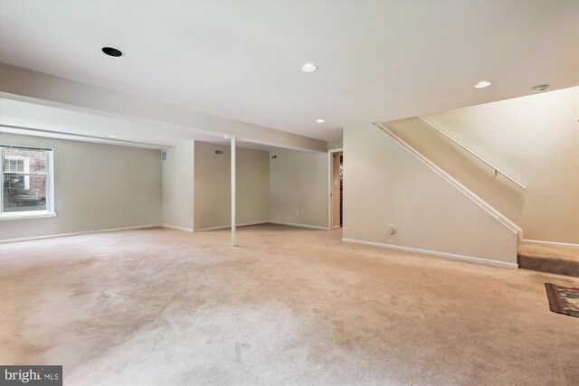 9417 Reach Rd, Potomac, MD 20854 - below grade area with light carpet, baseboards, recessed lighting, and stairs