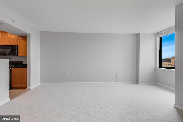 851 N Glebe Rd Unit 1413, Arlington, VA 22203 - unfurnished living room featuring light colored carpet and baseboards