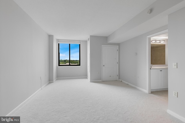 851 N Glebe Rd Unit 1413, Arlington, VA 22203 - unfurnished bedroom featuring light carpet and ensuite bathroom