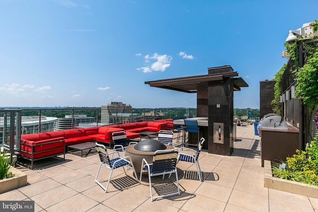 851 N Glebe Rd Unit 1413, Arlington, VA 22203 - view of patio / terrace with an outdoor living space with a fire pit