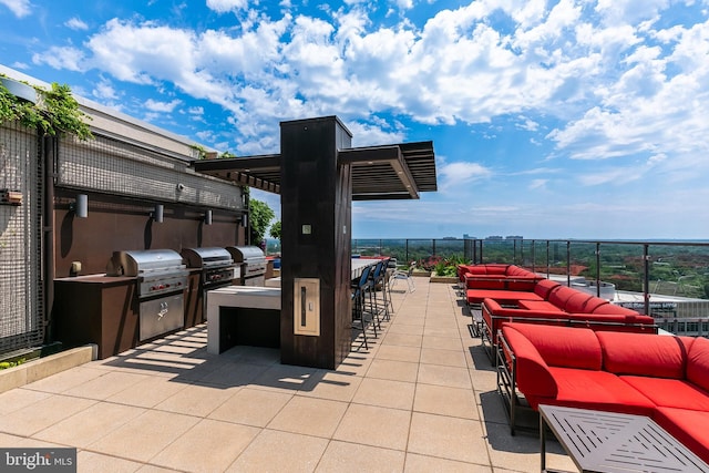 851 N Glebe Rd Unit 1413, Arlington, VA 22203 - view of patio / terrace featuring an outdoor living space, an outdoor bar, and an outdoor kitchen