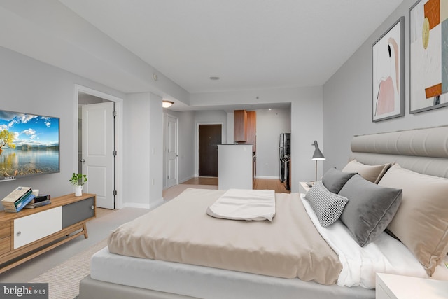 851 N Glebe Rd Unit 1413, Arlington, VA 22203 - bedroom with baseboards and light colored carpet