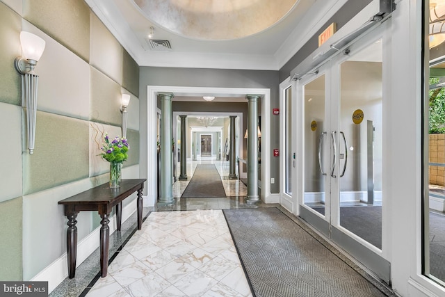 851 N Glebe Rd Unit 1413, Arlington, VA 22203 - hallway with ornate columns, a raised ceiling, and marble look tile flooring