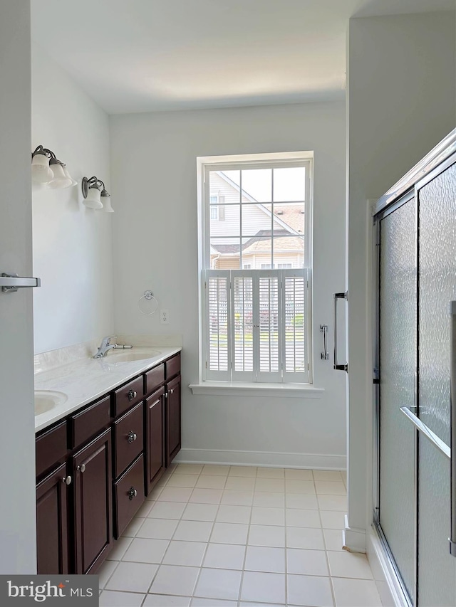 1039 Burgundy Cir, Pennsburg, PA 18073 - bathroom with a stall shower, healthy amount of natural light, and double vanity