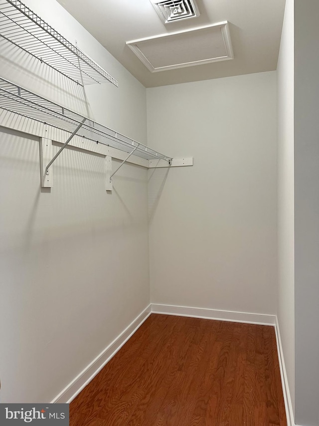 1039 Burgundy Cir, Pennsburg, PA 18073 - walk in closet featuring attic access and wood finished floors