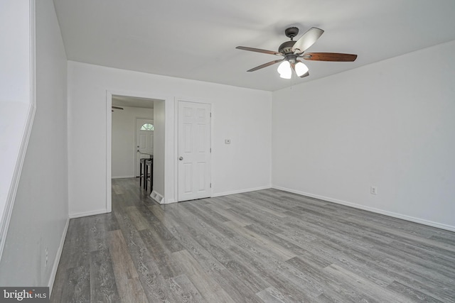 1549 S 8th St, Camden, NJ 08104 - unfurnished room featuring ceiling fan, wood finished floors, and baseboards