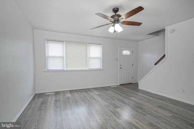 1549 S 8th St, Camden, NJ 08104 - entryway featuring a ceiling fan, plenty of natural light, wood finished floors, and baseboards