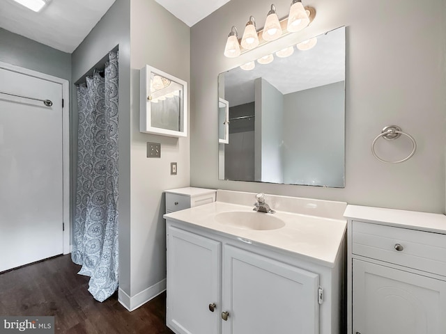 17 Butternut Ln, Hanover, PA 17331 - full bath with wood finished floors, vanity, and baseboards