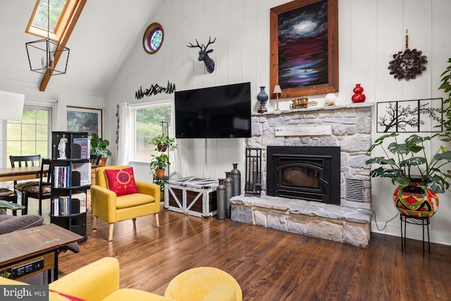 206 English Muffin Ct, Berkeley Springs, WV 25411 - living room featuring plenty of natural light, wood finished floors, high vaulted ceiling, and a fireplace