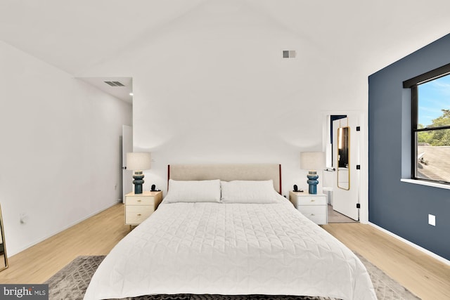 4020 35th St Unit B, Mount Rainier, MD 20712 - bedroom featuring wood finished floors and vaulted ceiling