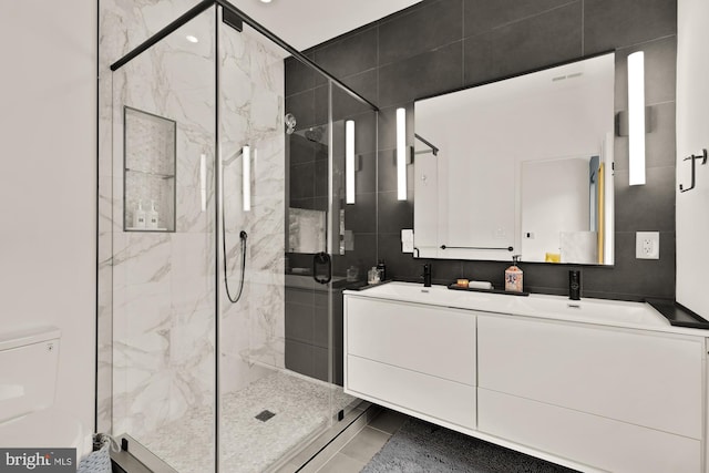4020 35th St Unit B, Mount Rainier, MD 20712 - bathroom with a marble finish shower and double vanity