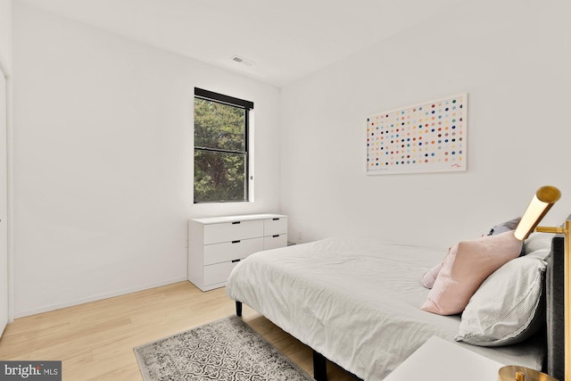 4020 35th St Unit B, Mount Rainier, MD 20712 - bedroom with light wood-type flooring and baseboards