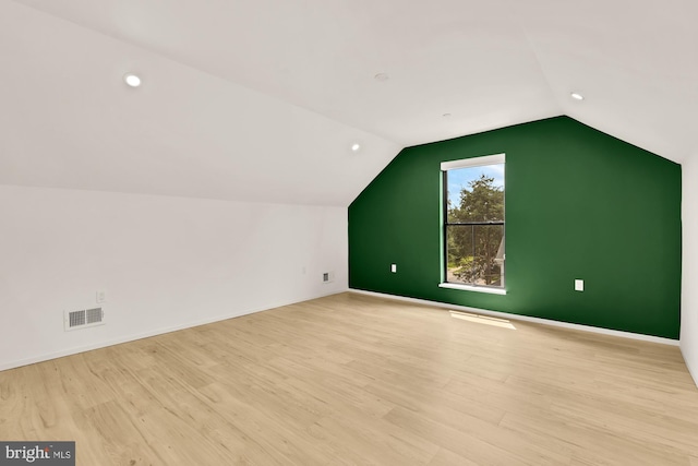 4020 35th St Unit B, Mount Rainier, MD 20712 - additional living space featuring vaulted ceiling, wood finished floors, and recessed lighting