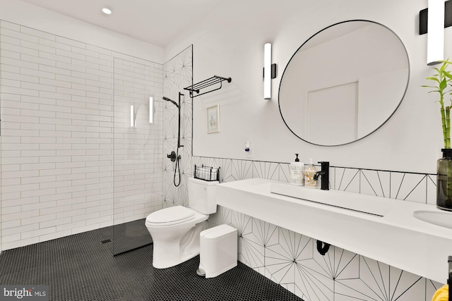 4020 35th St Unit B, Mount Rainier, MD 20712 - full bathroom featuring a walk in shower, tile walls, recessed lighting, a wainscoted wall, and tile patterned flooring