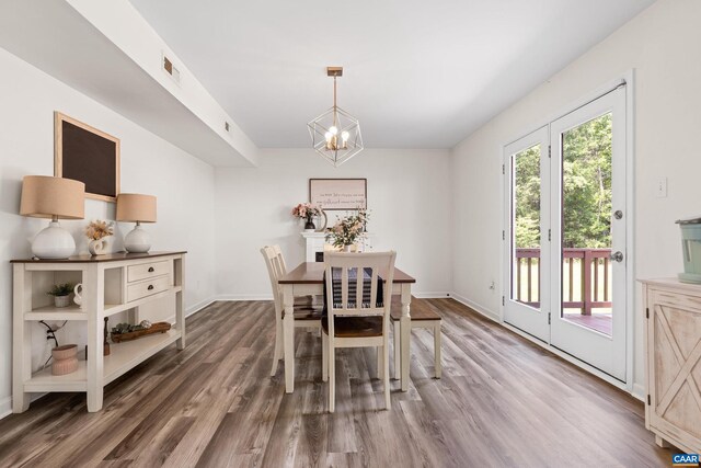 366 Saint Ivy Ave, Troy, VA 22974 - dining area featuring wood finished floors and a chandelier