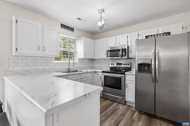 366 Saint Ivy Ave, Troy, VA 22974 - kitchen with appliances with stainless steel finishes, a peninsula, and white cabinetry