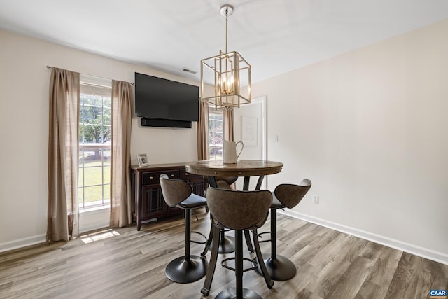 366 Saint Ivy Ave, Troy, VA 22974 - dining area featuring a chandelier and light wood-style floors